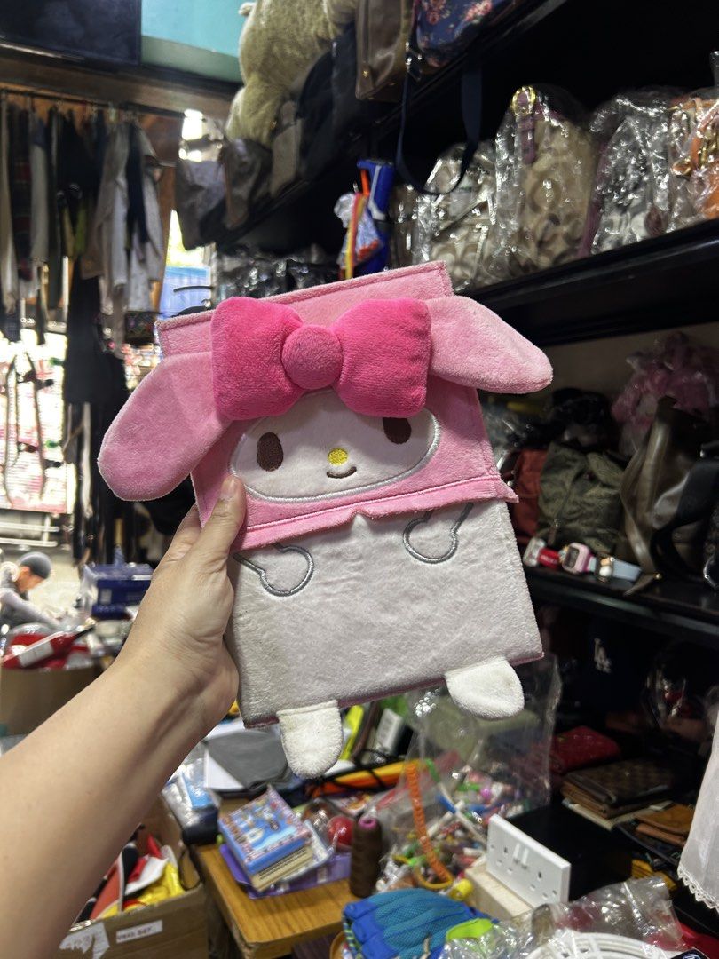 Sanrio My Melody Plush Folding Mirror (Category: Mirrors) located in Manila. Submitted by starbalesukandjapansurplus (Listing ID 1451554235, Image 2). Description: - Adorable My Melody folding mirror - Soft plush exterior with signature pink bow and ears - Opens to reveal a mirror for makeup touch-ups - Folds flat for convenient storage - A must-have for any Sanrio collector!.