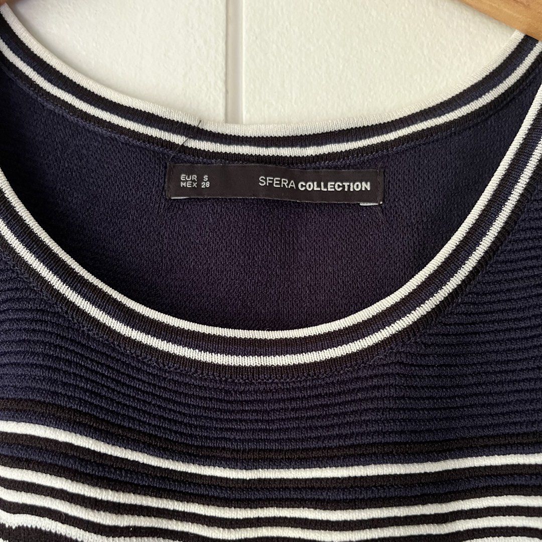 Sfera Stripe Knit Dress (Category: Dresses) located in Quezon City. Submitted by nchm88 (Listing ID 1451544390, Image 3). Description: Sfera stripe knit dress - fitted fit - comfortable to wear - navy blue, black, white stripe - subtle ruffle detail on hemline - hardly used, good as new - in good condition, no damages or stains - size small .