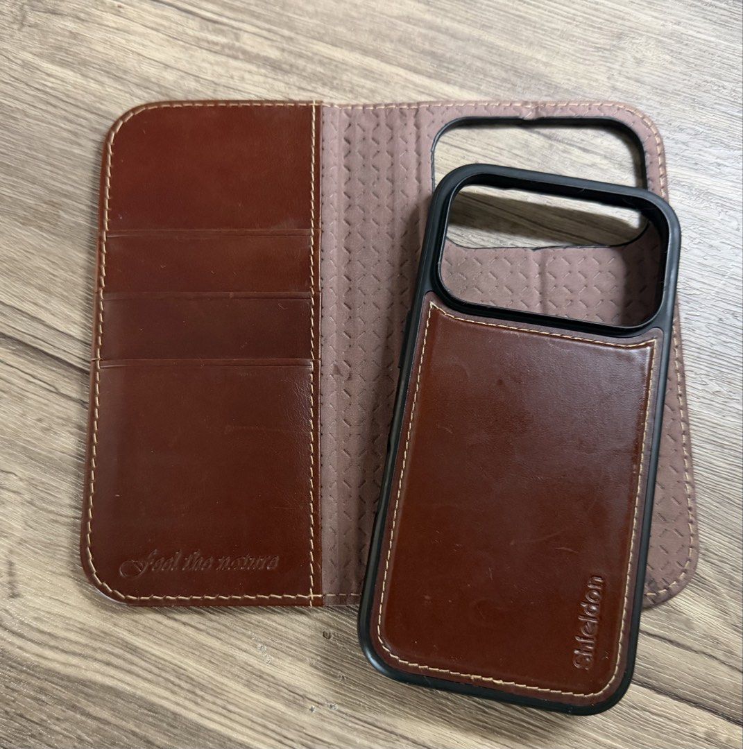 SHIELDON Removable Real Leather Wallet Case for iPhone 17 Pro (Category: Cases & Sleeves) located in Pasig City. Submitted by da__44 (Listing ID 1451541943, Image 2). Description: SHIELDON Removable Real Leather Wallet Case for iPhone 17 Pro, Retro Coffee Wireless Charging, Viewing Stand, Magnetic Closure, RFID Blocking, Credit Card Slot, Folio Shockproof Cover for Men Women BOUGHT IN AMAZON FOR $39.99 W scratches and scuffs due to wear and tear.