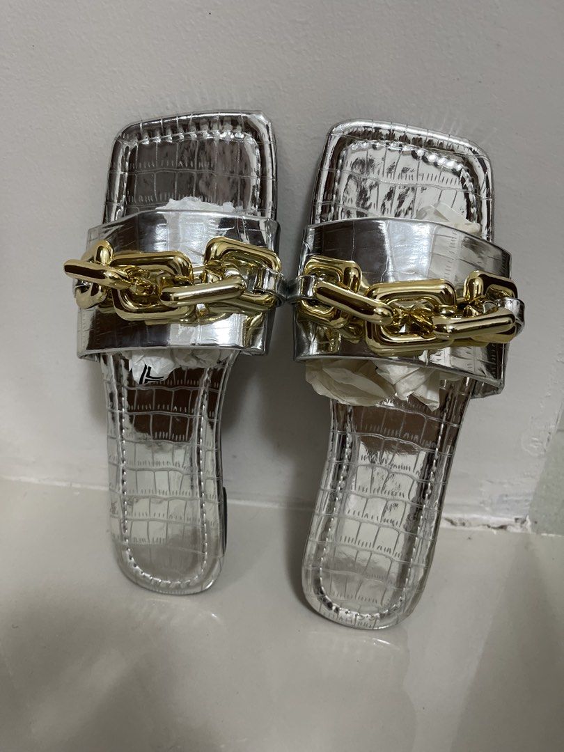 Silver Chain Square Toe Flat Sandals (Category: Flats & Sandals) located in Davao. Submitted by giftopia (Listing ID 1451618774, Image 2). Description: Chic silver flat sandals with gold chain detail. Features square toe and croc-effect sole. Easy slip-on. Size 37..