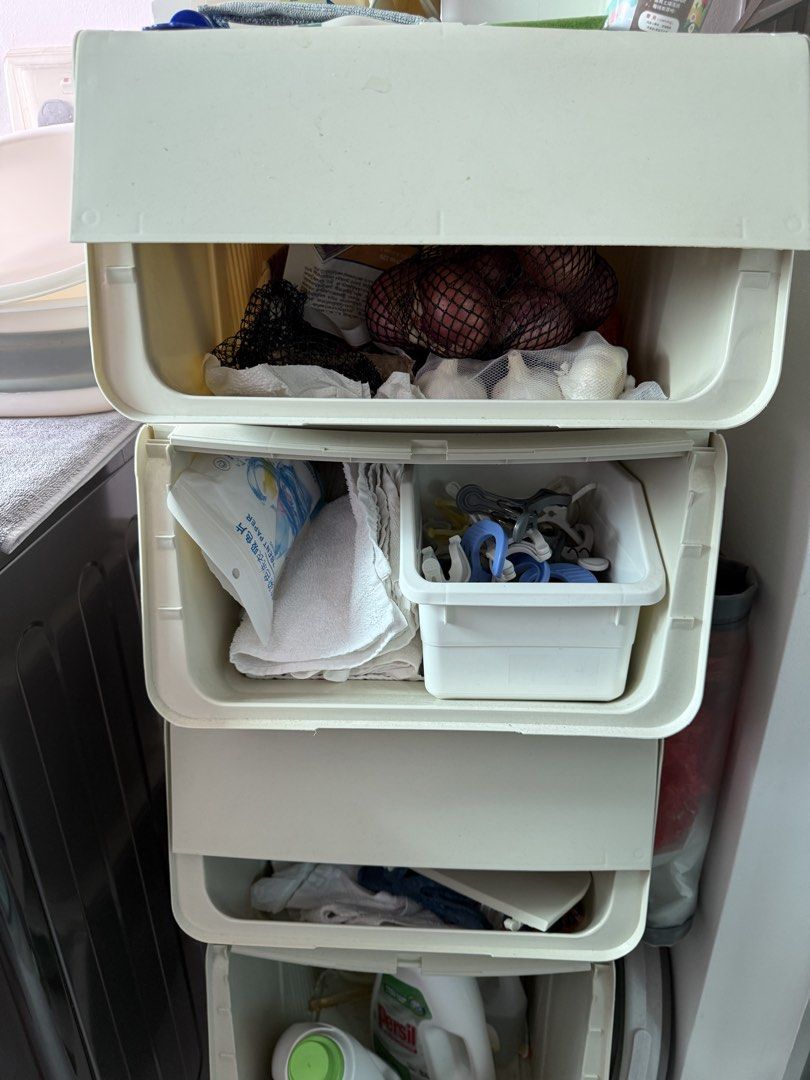 Stackable Storage Drawers (Category: Storage Boxes & Baskets) located in Singapore. Submitted by jkil01 (Listing ID 1451546891, Image 3). Description: Stackable storage drawers. Ideal for laundry supplies, kitchen items, or general household storage. Features a lid on the top drawer - can be folded into half for easy access. Simple to assemble and rearrange. Sold as a complete set of 4 drawers. Sold as-if $8.