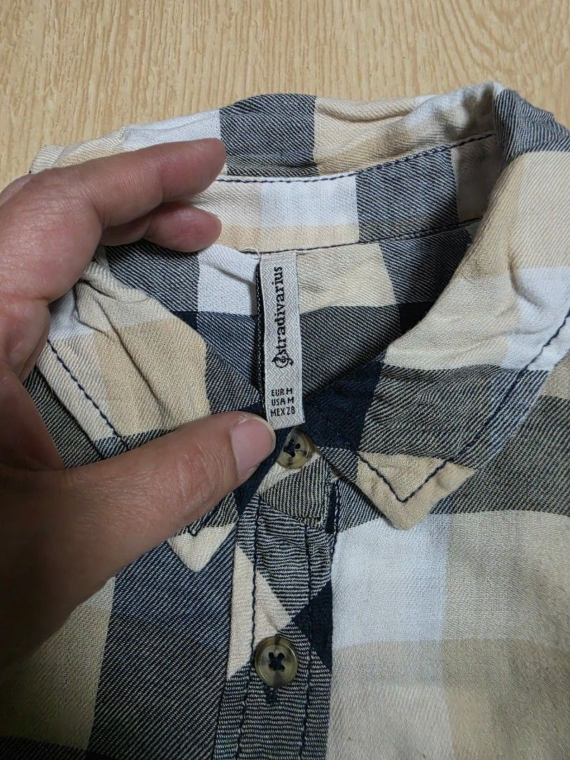 Stradivarius Plaid Flannel Shirt Size M (Category: Longsleeves) located in Makati City. Submitted by shopdoc (Listing ID 1451643970, Image 2). Description: - Classic plaid flannel shirt from Stradivarius - Features two chest pockets - Button-up front - Comfortable and stylish for everyday wear - Great for layering - Size: Medium (M) rfs decluttering.