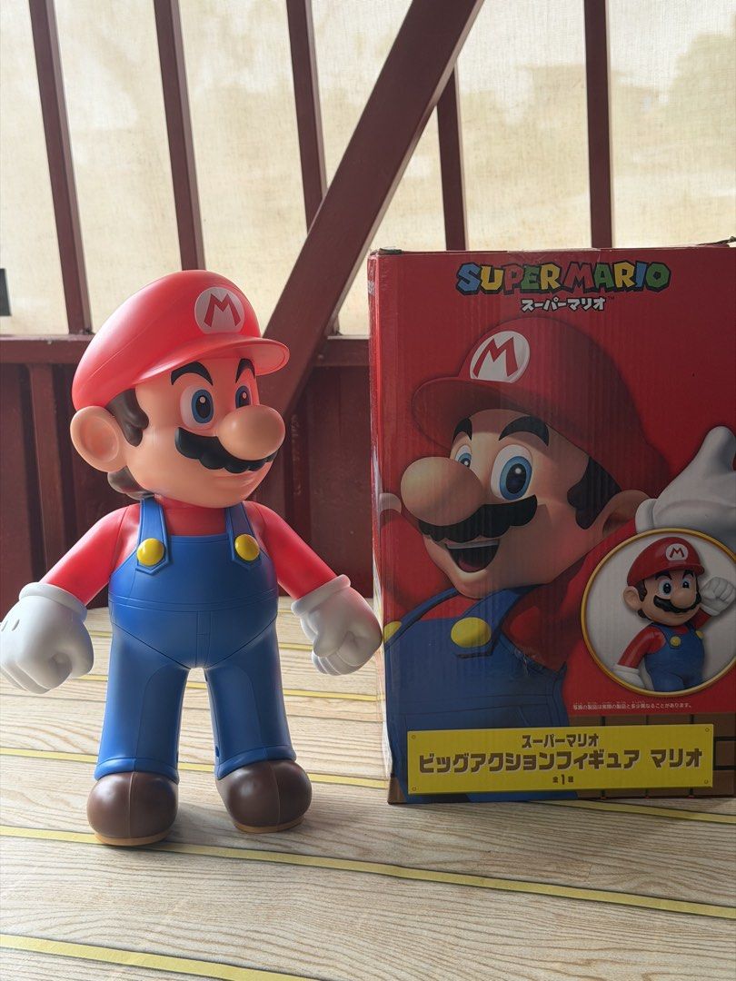 Super Mario Big Action Figure Toy (Category: Figurines & Statues) located in Quezon City. Submitted by oddshark.2b2afe (Listing ID 1451534965, Image 1). Description: - Large Super Mario action figure - Original box included - Great for any Mario fan's collection - Classic character.
