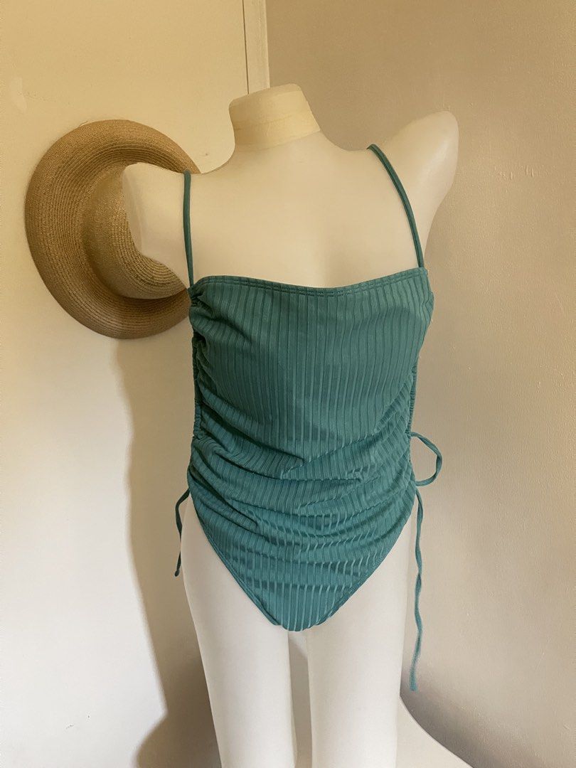 Teal swimsuit (Category: Bikinis & Swimsuits) located in Taguig. Submitted by declutterwithtally (Listing ID 1451607159, Image 1). Description: 🌊 Preloved Swimsuits for Sale 👙 Available Styles: One-piece Two-piece Brands: Zaful and SHEIN Condition: Brand new (never worn) Like new (excellent condition) used 1-2x Size: Large on tag Best fits: Bust:40A Waist:30–32 inches Perfect for beach trips, pool days, vacations, or your next getaway! All item