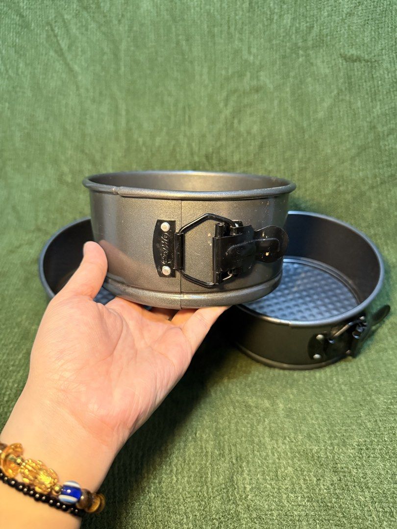 (THREE PIECES) Wilton Springform Pan (Category: Bakeware) located in Manila. Submitted by georgethjafine (Listing ID 1451688886, Image 1). Description: - Set of 3 round springform cake pans - Non-stick surface for easy release - Detachable sides for effortless cake removal - Textured bottom design - Ideal for cheesecakes and various desserts.