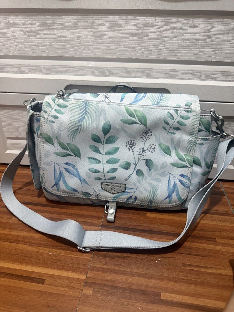 Twelvelittle Diaper Bag (stroller caddy) (Category: Diaper Bags & Wetbags) located in Pasig City. Submitted by cesstoh (Listing ID 1451547053, Image 3). Description: Pre-loved diaper bag With change diaper pad Issue: discoloration Courier: j&t.