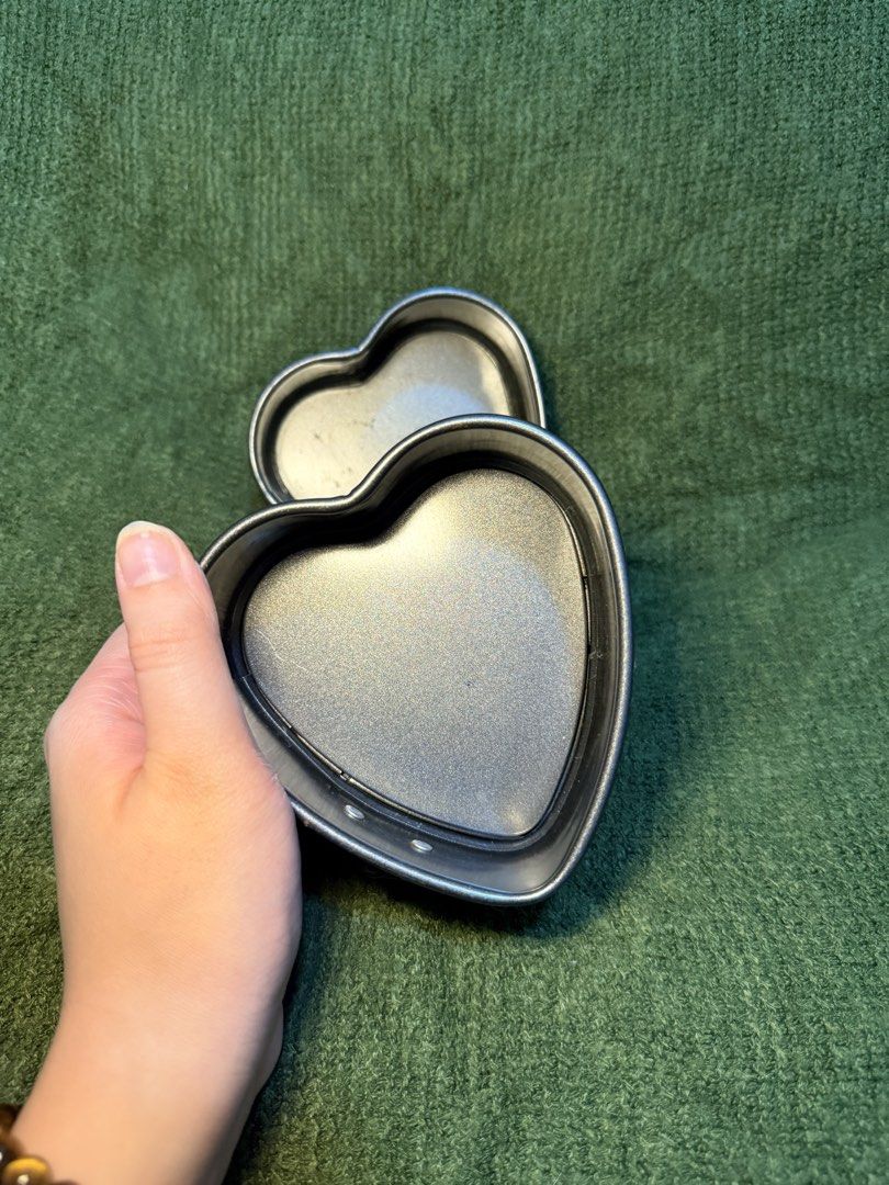 (TWO PIECES) Heart Shaped Mini Springform Cake Pan with Removable Bottom (Category: Bakeware) located in Manila. Submitted by georgethjafine (Listing ID 1451687854, Image 2). Description: - Set of 2 heart-shaped mini cake pans - Perfect for small desserts, individual portions, or Valentine's Day - Features non-stick coating for easy release - Removable bottom for hassle-free cake removal.