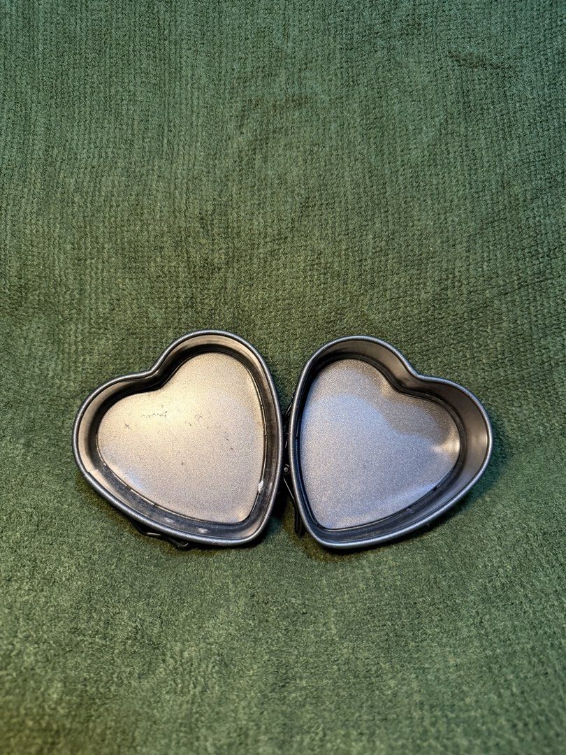 (TWO PIECES) Heart Shaped Mini Springform Cake Pan with Removable Bottom (Category: Bakeware) located in Manila. Submitted by georgethjafine (Listing ID 1451687854, Image 1). Description: - Set of 2 heart-shaped mini cake pans - Perfect for small desserts, individual portions, or Valentine's Day - Features non-stick coating for easy release - Removable bottom for hassle-free cake removal.