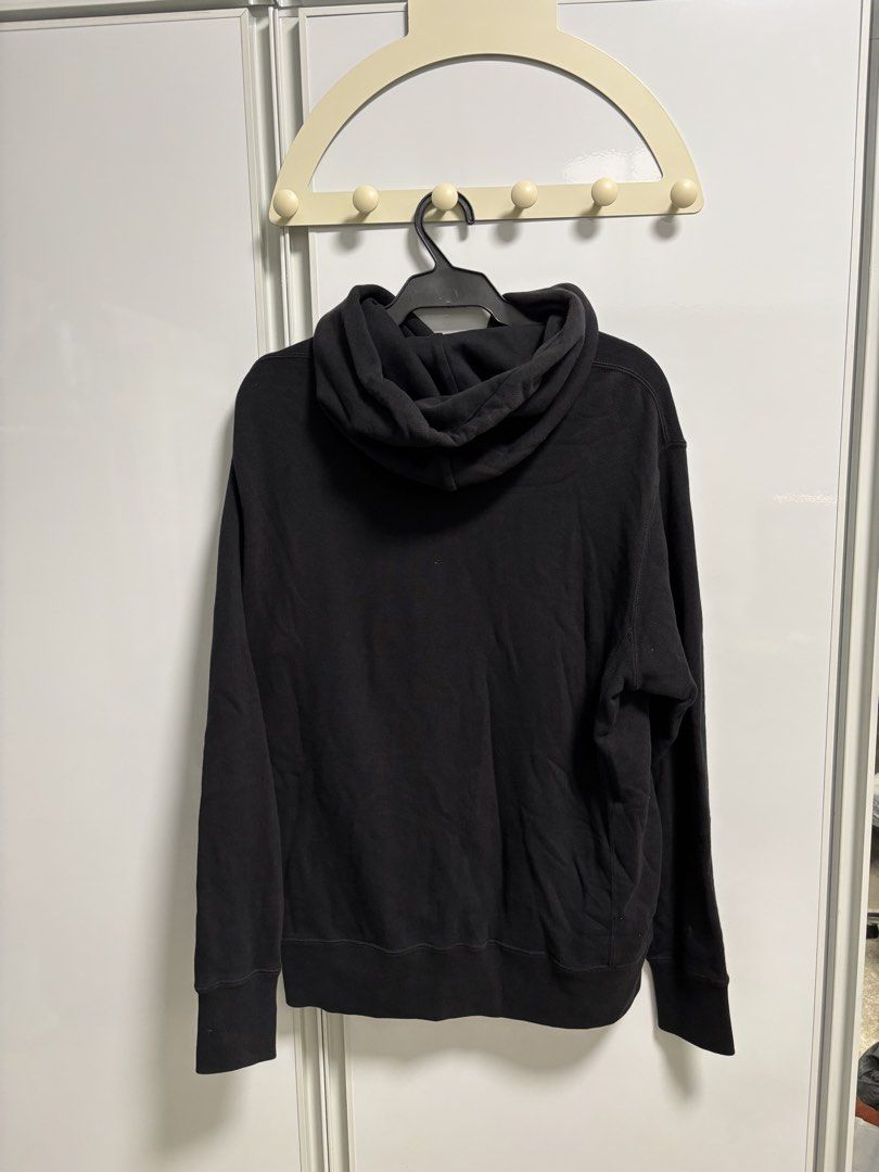 Uniqlo Black Hoodie (Category: Coats, Jackets and Outerwear) located in San Fernando. Submitted by blique2018 (Listing ID 1451653409, Image 2). Description: - Uniqlo Black Boxy Hoodie - Size: L - Dimes: 21x25 - Condition: 7/10, with brown discoloration on the collar and hoodie area - Shipping: via Lalamove / Grab (Shouldered by the buyer); Can go for meetup near UST - MOP: BDO/Gcash - RFS: Decluttering.