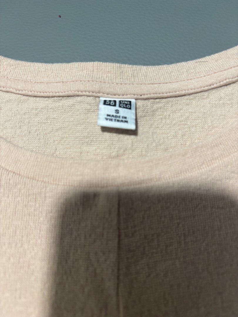 Uniqlo Puff Sleeve Top Size S (Category: Blouses) located in Manila. Submitted by jing3021 (Listing ID 1451535824, Image 2). Description: - Light pink Uniqlo top - Short puff sleeves - Textured fabric - Simple round neckline - Versatile for casual or dressed-up occasions - Fits true to size.