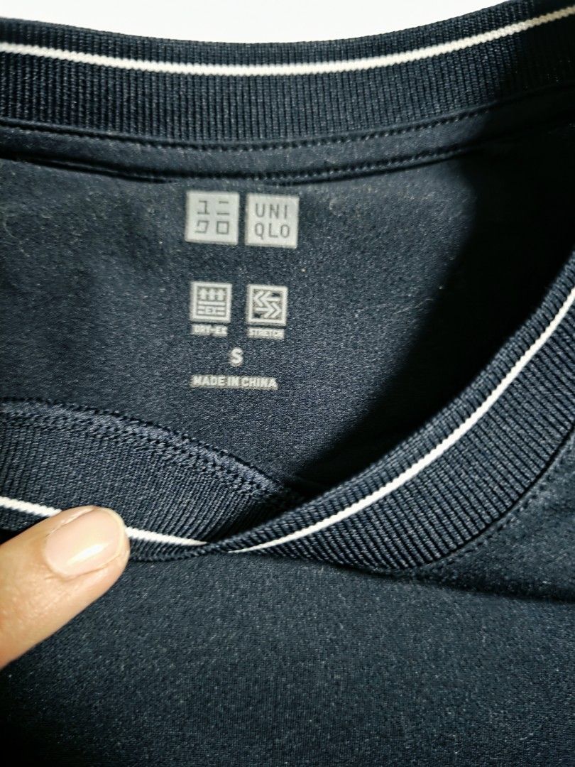 Two Uniqlo T-shirts (Navy blue & White) (Category: Shirts) located in Makati City. Submitted by shopdoc (Listing ID 1451639874, Image 3). Description: - Set of 2 Uniqlo T-shirts - Size: Medium (M) - Colors: 1 Navy blue, 1 White - Black T-shirt Features: DRY-EX, STRETCH - Ideal for everyday wear, layering, or as a standalone piece - Material: Made in China rfs decluttering selling as bundle for faster disposal.