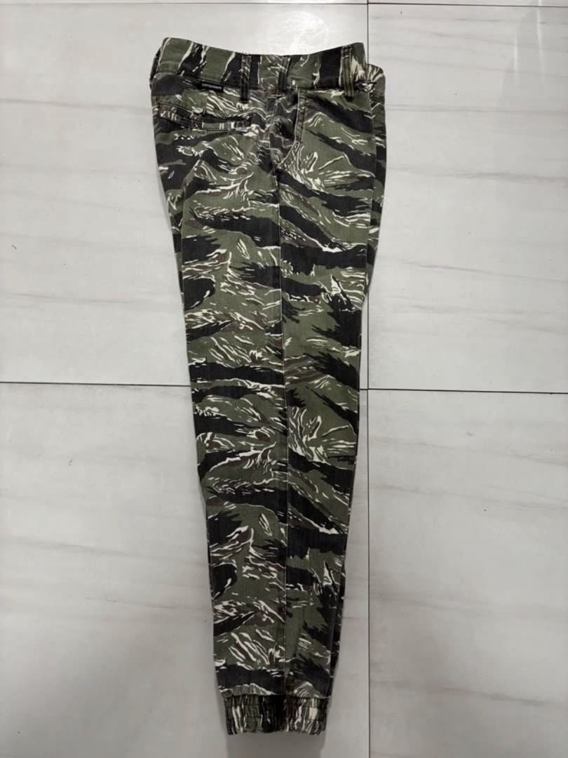 Untouched Tiger Camo Jogger Pants Size M (Category: Joggers) located in Quezon City. Submitted by edether (Listing ID 1451630359, Image 3). Description: - Brand: Untouched - Style: Tiger Camo Joggers - Size: Medium (M) - Features: Elasticated cuffs - Ideal for: Casual wear - Unique design: Stand out with the tiger camouflage pattern UNISEX Waist - 30in Length- 36in If you see it posted, it’s available. Last price and details are posted. No reply 