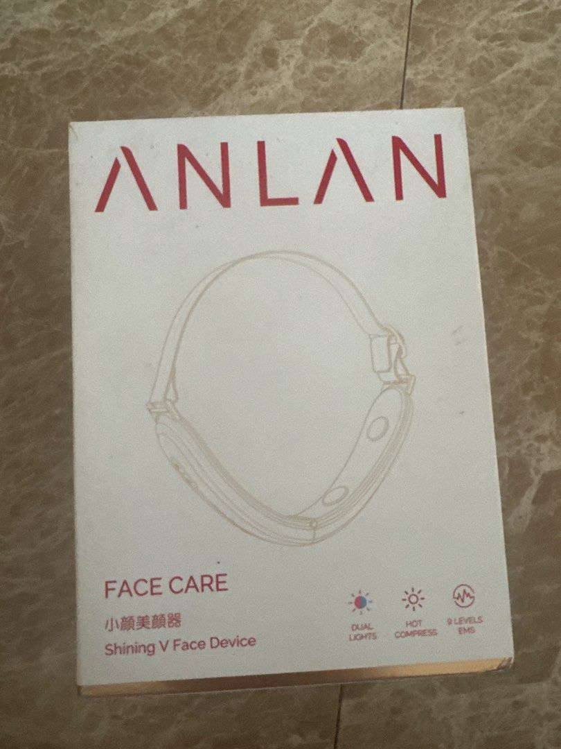 Updated ANLAN V Face Device EMS Heat Massage Red/Blue Light (Category: Face Care) located in Manila. Submitted by happy_toktokshop (Listing ID 1451405873, Image 2). Description: - ANLAN V Face Device: Achieve a V-shaped jawline. - EMS Heat Massage: Gentle warming massage for skin rejuvenation. - Red & Blue Light Therapy: Targets skin concerns for a clearer complexion. - Double Chin Reduction: Specifically designed to help slim the chin area. - Ea