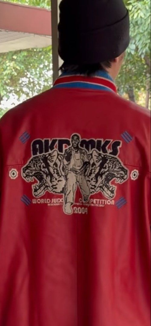Vintage Akademiks 2004 Varsity Jacket Genuine Leather (Category: Coats, Jackets and Outerwear) located in Quezon City. Submitted by lootboxlab (Listing ID 1451674813, Image 3). Description: - Eye-catching red and black varsity jacket - Features unique embroidered patches on front and back - Ribbed cuffs and hem for a snug fit - Classic button-up front - Perfect for layering and casual wear - Sporty vibe, great for everyday style.
