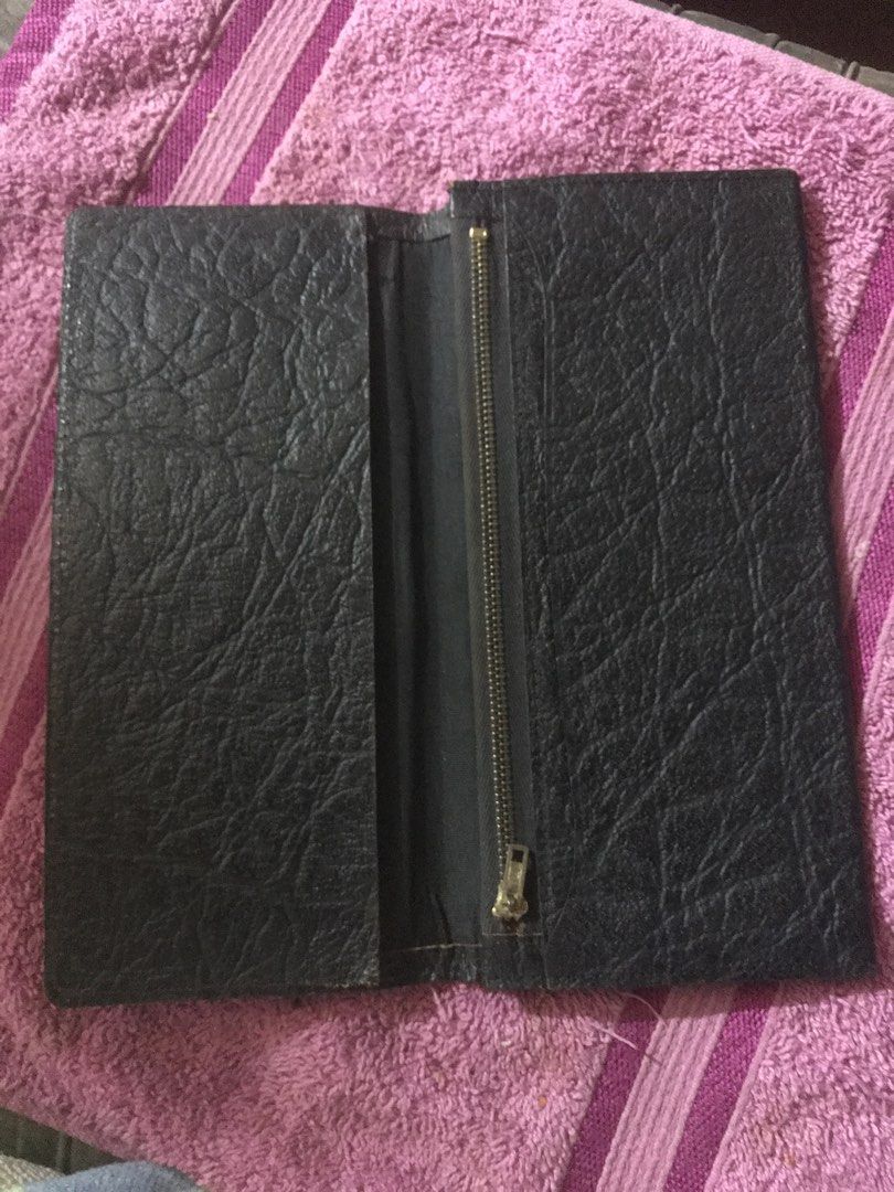 Vintage Black Leather Long Wallet with Zipper (Category: Wallets & Card holders) located in Marikina City. Submitted by theconstantdeclutterer (Listing ID 1451608856, Image 2). Description: -Vintage classic thin black leather long wallet with zipper. Medium size. Old stock and unused. Ample space for cards and cash. Timeless design for daily use. -One small portion inside needs gluing. 2-3 small scratches due to storage. Get this now! .