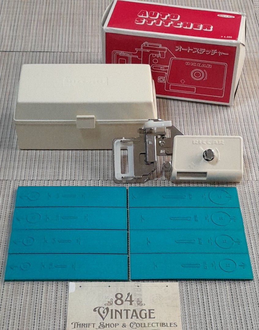 Vintage Riccar Auto Stitcher (Category: Craft Supplies & Tools) located in Las Pinas. Submitted by 84vintage (Listing ID 1451564637, Image 1). Description: This is a vintage Riccar Auto Stitcher sewing machine attachment. The set includes a white plastic storage case, the attachment itself, and blue pattern plates for creating various stitches, such as buttonholes. It is designed to create patterns like buttonholes, eyelets, and embroidery when a