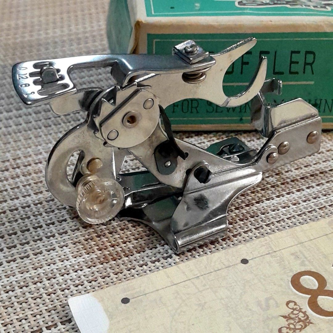 Vintage Singer Ruffler Foot (Category: Craft Supplies & Tools) located in Las Pinas. Submitted by 84vintage (Listing ID 1451563223, Image 2). Description: This is a vintage Singer Ruffler Foot, model 55705, designed for low-shank sewing machines to create even ruffles and gathers. Includes specialized adjustable blades for creating folds and crumples. Actual photos posted. Please examine them carefully as they are part of the description. --📌 MU