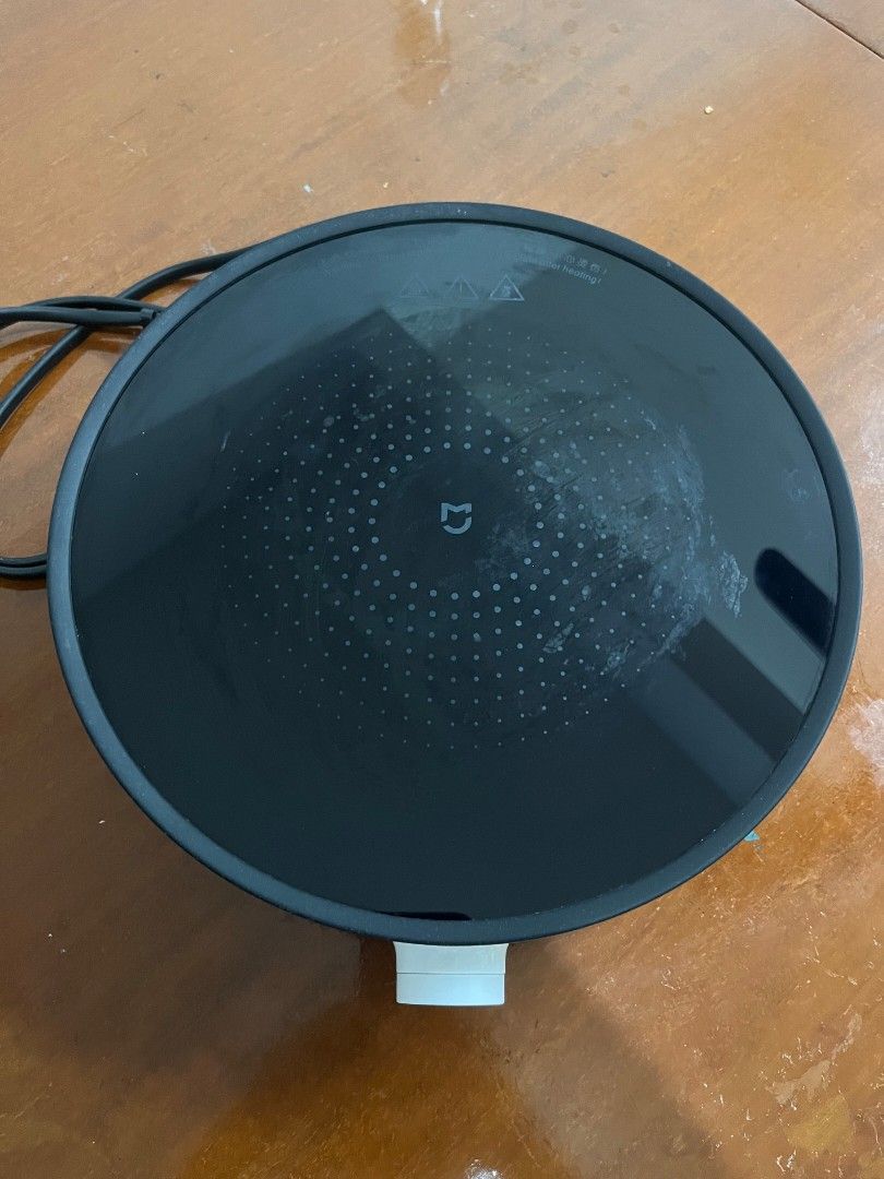 Xiaomi Induction Cooker (Category: Cookers) located in Kuala Lumpur. Submitted by livefish.936ec9 (Listing ID 1451632739, Image 1). Description: Condition: 9/10 - 9-block LED firepower display - 2100w high power heating - Lightweight, 280×265×70 mm - Automatic overheat protection and pot detection.
