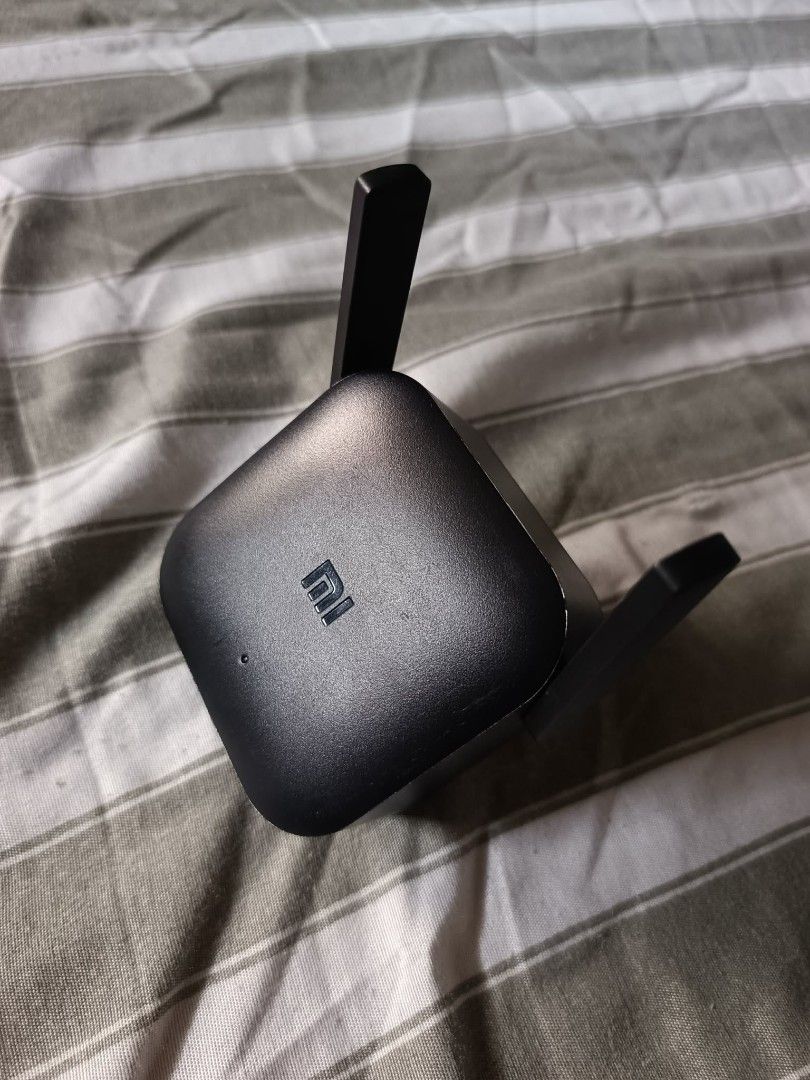 Xiaomi Mi Wi-Fi Range Extender & 2 JBL Head Set (Category: Networking) located in Manila. Submitted by bautistaam16 (Listing ID 1451556143, Image 1). Description: - Xiaomi Mi Wi-Fi Range Extender - Color: Black - Features two antennas - Small indicator light on front - Boosts and extends your Wi-Fi signal coverage - Easy to set up and use - Ideal for home or office.