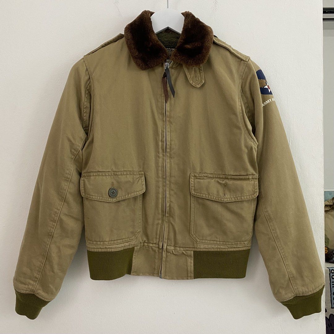 3-DAYS UNION B-10 Flight Jacket (Category: Coats, Jackets and Outerwear) located in Cavite. Submitted by mana__ (Listing ID 1451878040, Image 1). Description: - Khaki bomber jacket - Detachable brown fur collar - Fuzzy green lining - Two front flap pockets with button closure - 'Army Air Forces' patch on left sleeve - Zipper closure with leather pull tab - Ribbed cuffs and hem - Small on tag Xs frame Width - 18.8 Length - 23 Shoulders - 25 Sleeve