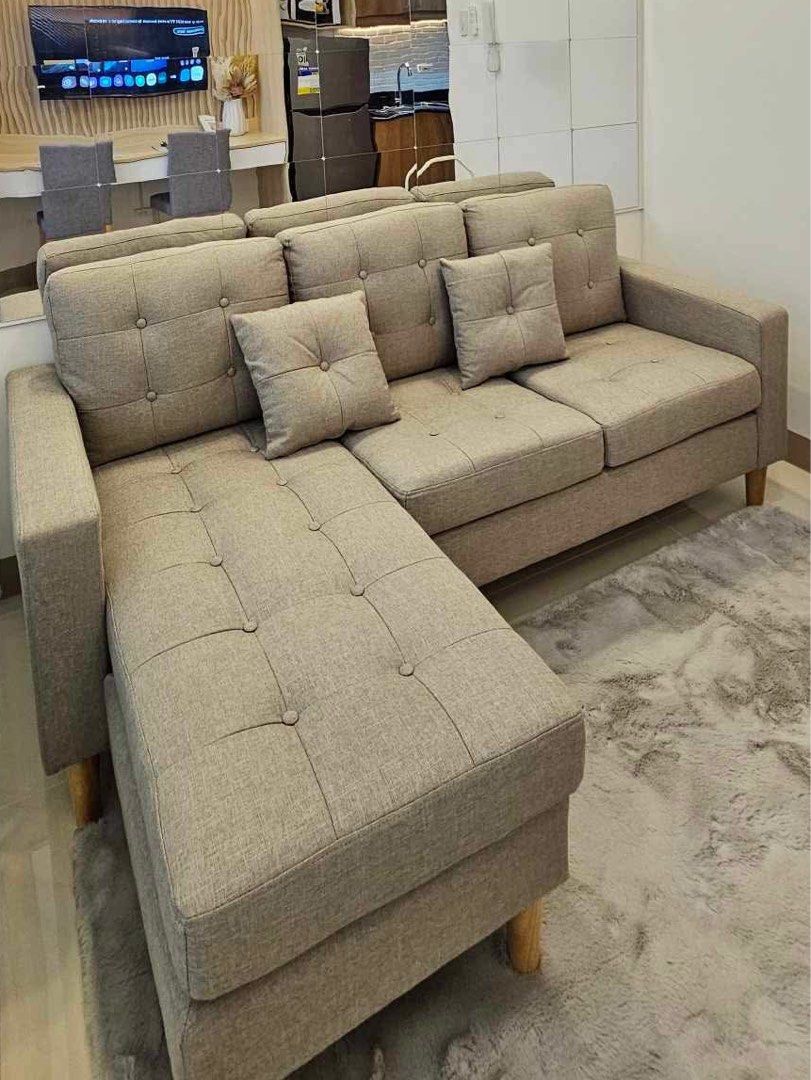 3-seater adjustable sofa with ottoman (Category: Sofas) located in Paranaque City. Submitted by pattydee_ (Listing ID 1451835473, Image 2). Description: Mandaue Foam Greige color Lightly Used but not abused No fabric or material damage Message me for more photos and dimensions Negotiable for sure buyers Pick-up at Makati or book delivery via transportify/lalamove Rfs: Moving out.
