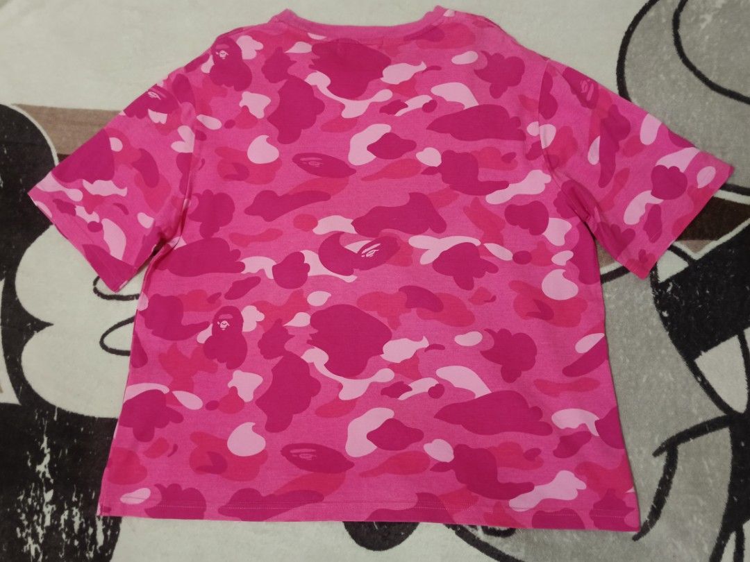 A Bathing Ape Pink Camo Bape Tee (Category: Tshirts & Polo Shirts ) located in Solano. Submitted by andrewfrancisco2.0 (Listing ID 1451887202, Image 3). Description: A Bathing Ape Pink Camo Bape Tee SIZE SMALL ON TAG ISSUE/S ‼️: MINIMAL CRACKPRINTS FRONT PRINT DESIGN COLOR RATE 9/10 CONDITION 9/10 P1800 PLUS SF DIMENSIONS W 22 L 23 NUEVA VIZCAYA LOC 📍 MODE OF PAYMENT THROUGH GCASH PAYMENT FIRST NO COD CAN DO VC/ PICTURE WITH THE ITEM PM NALANG P