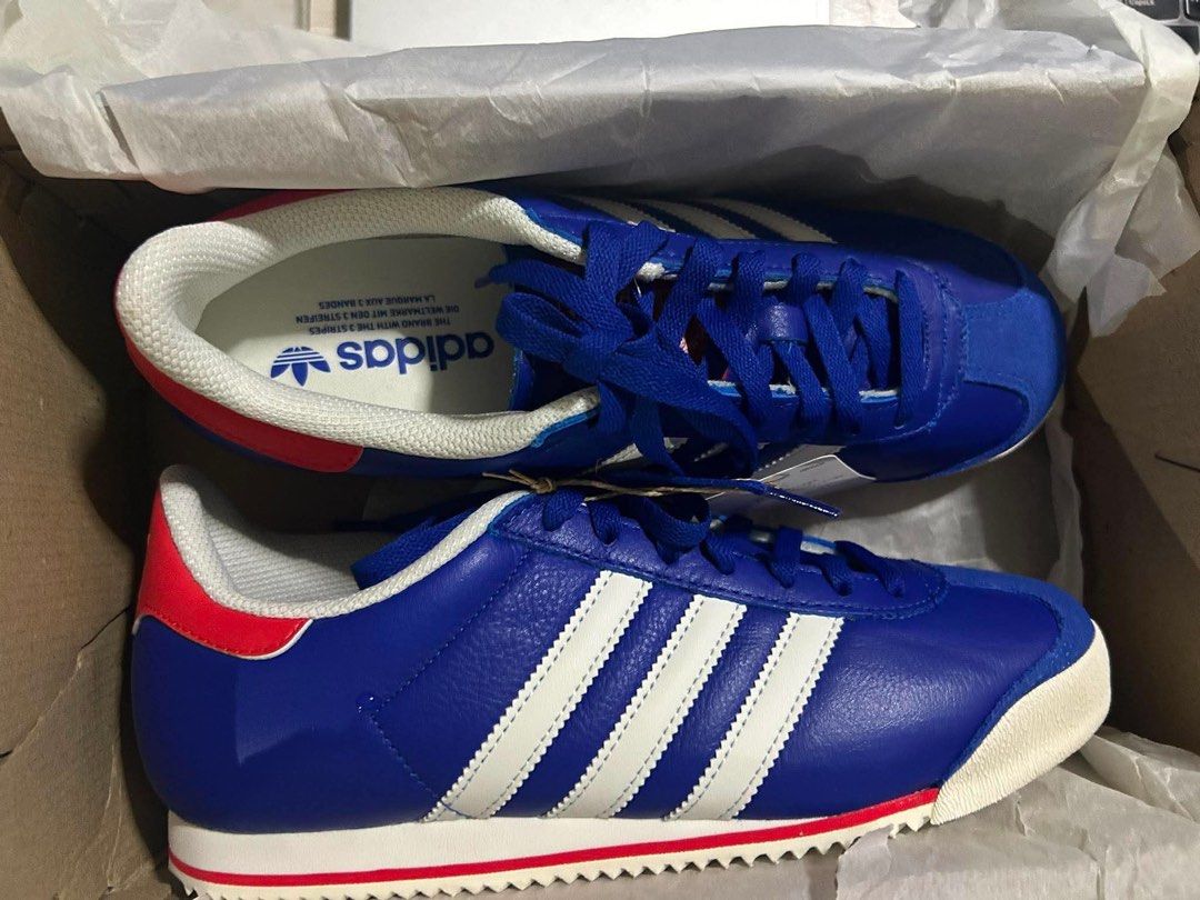 Adidas K 74 (Category: Sneakers) located in Quezon City. Submitted by __hal (Listing ID 1451796235, Image 2). Description: - Adidas K 74 sneakers - Color: Blue with white stripes - Comes in original box - Size: 8 US - Never been used.