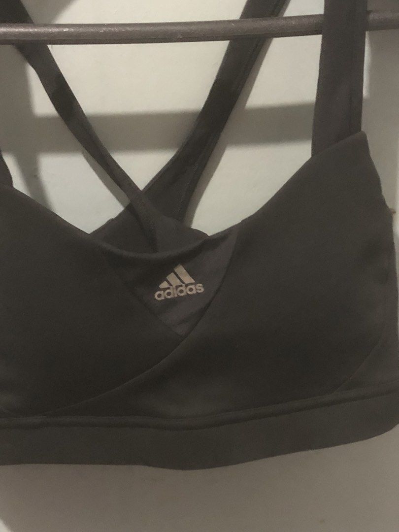 Adidas Sports Bra Size S (Category: Activewear) located in Quezon City. Submitted by unique2shop (Listing ID 1451825871, Image 2). Description: - Adidas sports bra in black - Stylish criss-cross strap design at the back - Features the iconic Adidas logo on the front - Made in Indonesia - Versatile for workouts or everyday comfort.