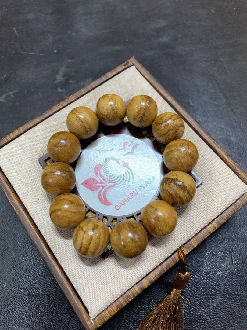 Agarwood bracelet gaharu natural wooden prayer handmade premium fragrant round wooden beads islamic muslim luxury men's women's traditional collectible genuine meditation spiritual gift artisan classic tasbih manik kayu wangian (Category: Bracelets) located in Muar. Submitted by suhailah_ (Listing ID 1451719819, Image 2). Description: Material: Natural wood with unique grain patterns. Bead shape: Round. Bead quantity visible: 12 beads. Bracelet c