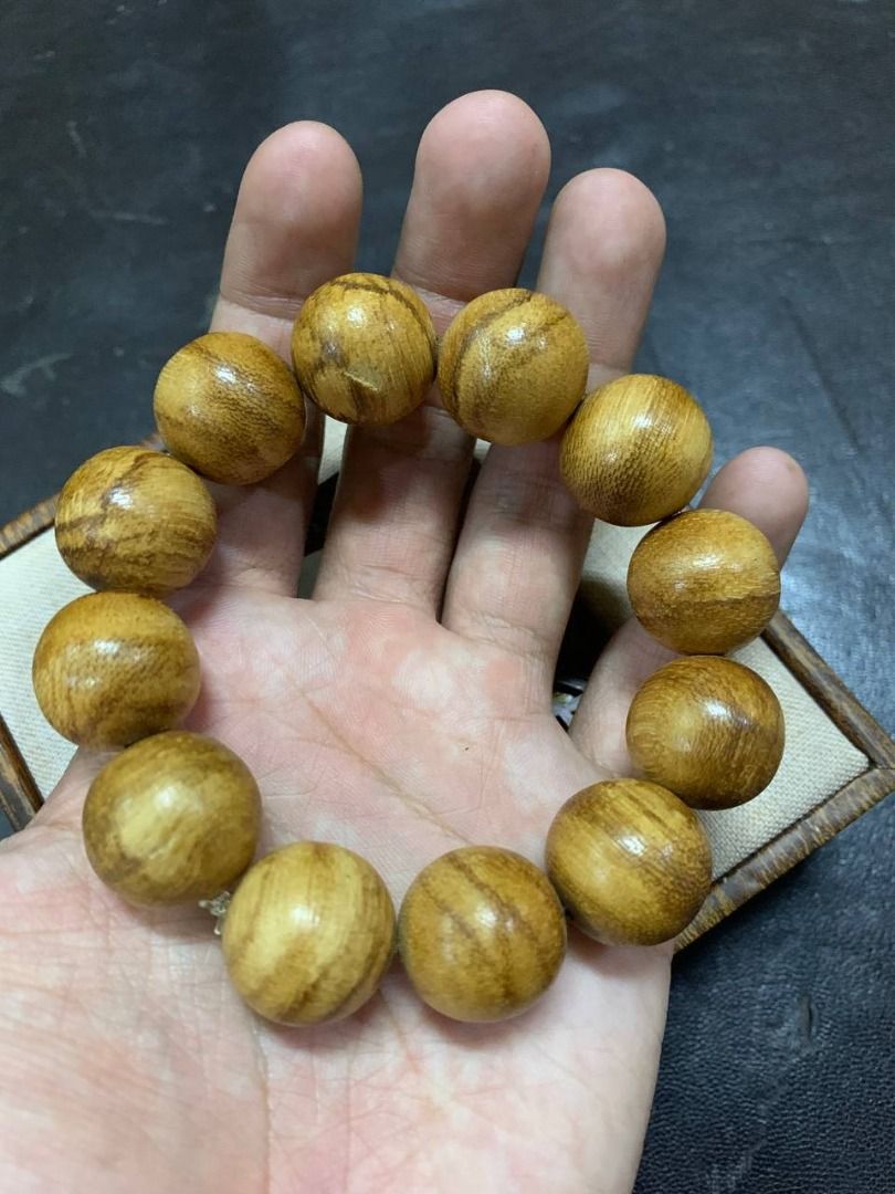 Agarwood bracelet gaharu natural wooden prayer handmade premium fragrant round wooden beads islamic muslim luxury men's women's traditional collectible genuine meditation spiritual gift artisan classic tasbih manik kayu wangian (Category: Bracelets) located in Muar. Submitted by suhailah_ (Listing ID 1451719819, Image 3). Description: Material: Natural wood with unique grain patterns. Bead shape: Round. Bead quantity visible: 12 beads. Bracelet c