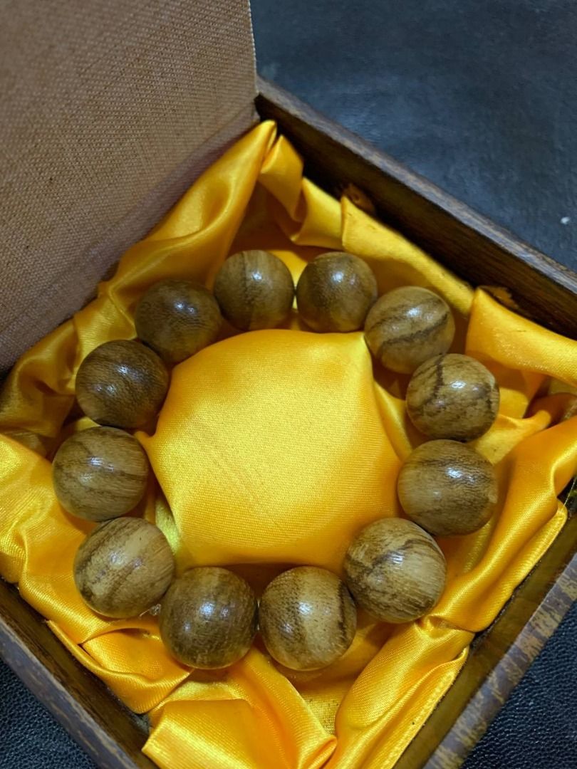 Agarwood bracelet gaharu natural wooden prayer handmade premium fragrant round wooden beads islamic muslim luxury men's women's traditional collectible genuine meditation spiritual gift artisan classic tasbih manik kayu wangian (Category: Bracelets) located in Muar. Submitted by suhailah_ (Listing ID 1451719819, Image 1). Description: Material: Natural wood with unique grain patterns. Bead shape: Round. Bead quantity visible: 12 beads. Bracelet c