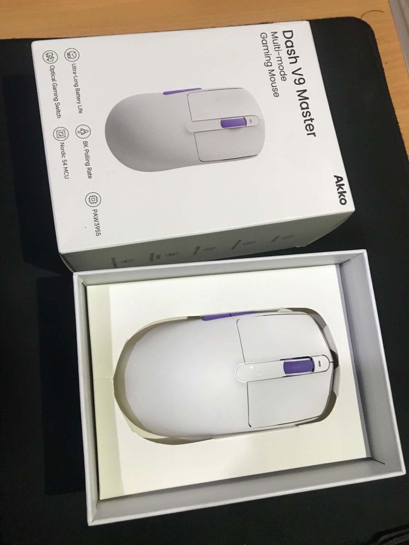 Akko Dash V9 Master Multi-mode Gaming Mouse White (2 Weeks warranty) (Category: Mouse & Mousepads) located in Mabalacat. Submitted by cornistaja55233 (Listing ID 1451881988, Image 1). Description: - ₱3999 Orig Price Brand New binuksan lang - Akko Dash V9 Master Gaming Mouse - Color: White with Purple Accents - Multi-mode functionality - Includes: USB Receiver, Charging Cable, Extra Mouse Feet - Original Box Included - Ideal for Gaming.