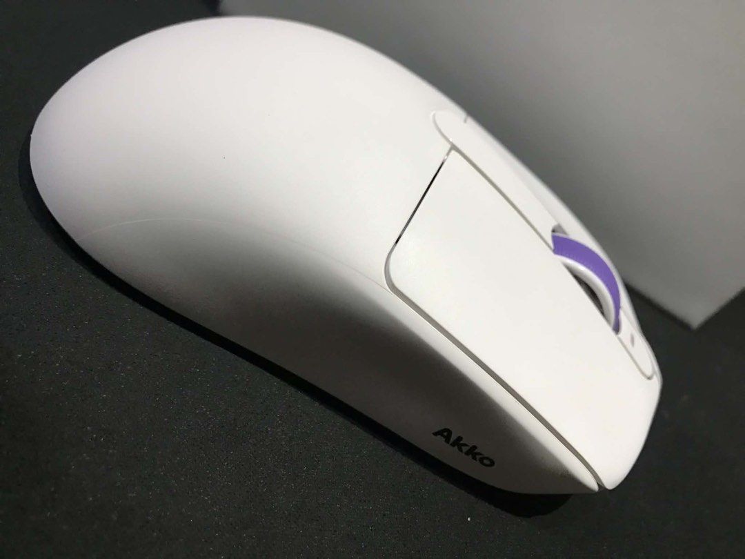 Akko Dash V9 Master Multi-mode Gaming Mouse White (2 Weeks warranty) (Category: Mouse & Mousepads) located in Mabalacat. Submitted by cornistaja55233 (Listing ID 1451881988, Image 2). Description: - ₱3999 Orig Price Brand New binuksan lang - Akko Dash V9 Master Gaming Mouse - Color: White with Purple Accents - Multi-mode functionality - Includes: USB Receiver, Charging Cable, Extra Mouse Feet - Original Box Included - Ideal for Gaming.