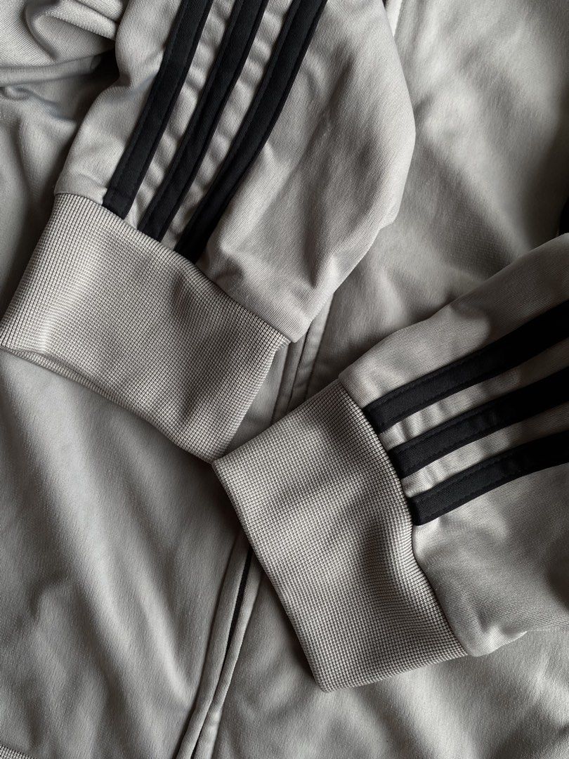 Authentic Adidas 3-Stripes Full-Zip Track Jacket - Heather Grey / Black ⚡️👟 (Category: Hoodies) located in Puerto Princesa. Submitted by thriftedheatshub (Listing ID 1451826801, Image 3). Description: DESCRIPTION: 📌 🔥 CLASSIC ATHLETIC / STREETWEAR TRACK JACKET DRIP! Up for grabs is an authentic Adidas Full-Zip Track Jacket in a clean grey and black contrast colorway. Features iconic 3-Stripes down the sleeves, embroidered Adidas chest logo, st