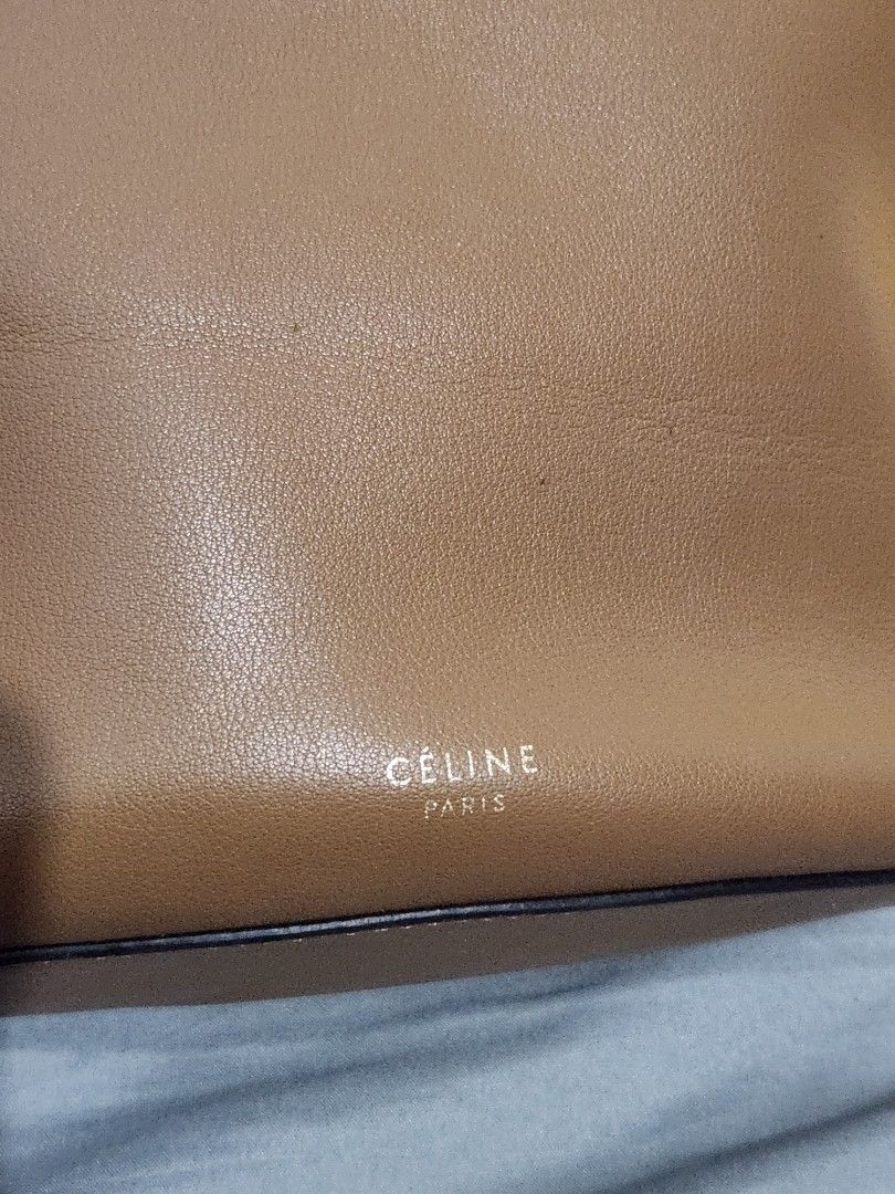 Authentic Celine Brown Leather Bucket Bag (Category: Luxury Bags & Wallets) located in Cainta. Submitted by pumbamnl (Listing ID 1451798794, Image 2). Description: - Authentic Celine brown leather bucket bag - Classic and timeless design - Ideal for everyday use Needs repair on stitch but still usable Please do not haggle. I do not have last price. This is so cheap na, pls google 2nd hand selling price. .