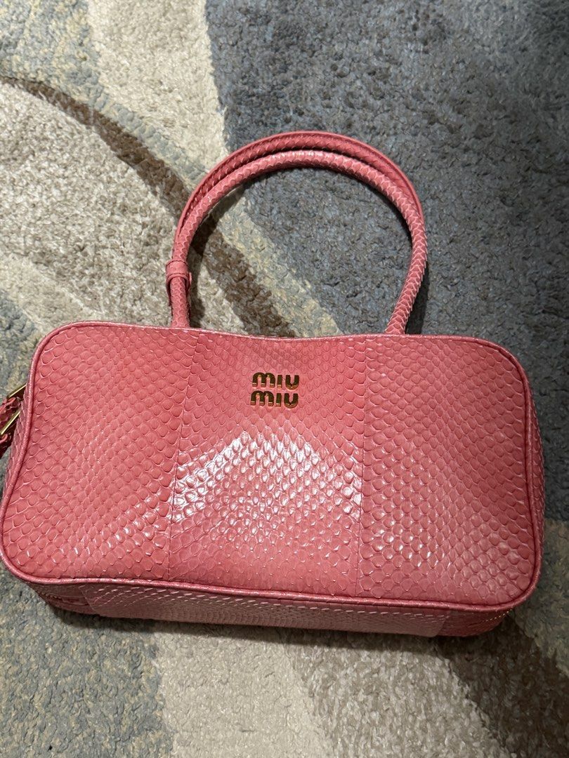 SALE FROM 42k Authentic Rare exotic Miu Miy beau petal pink python (Category: Luxury Bags & Wallets) located in Pasig City. Submitted by balenciaga.couture (Listing ID 1451761035, Image 1). Description: with dustbag exotic rare genuine python skin in beautiful pink petal shade .