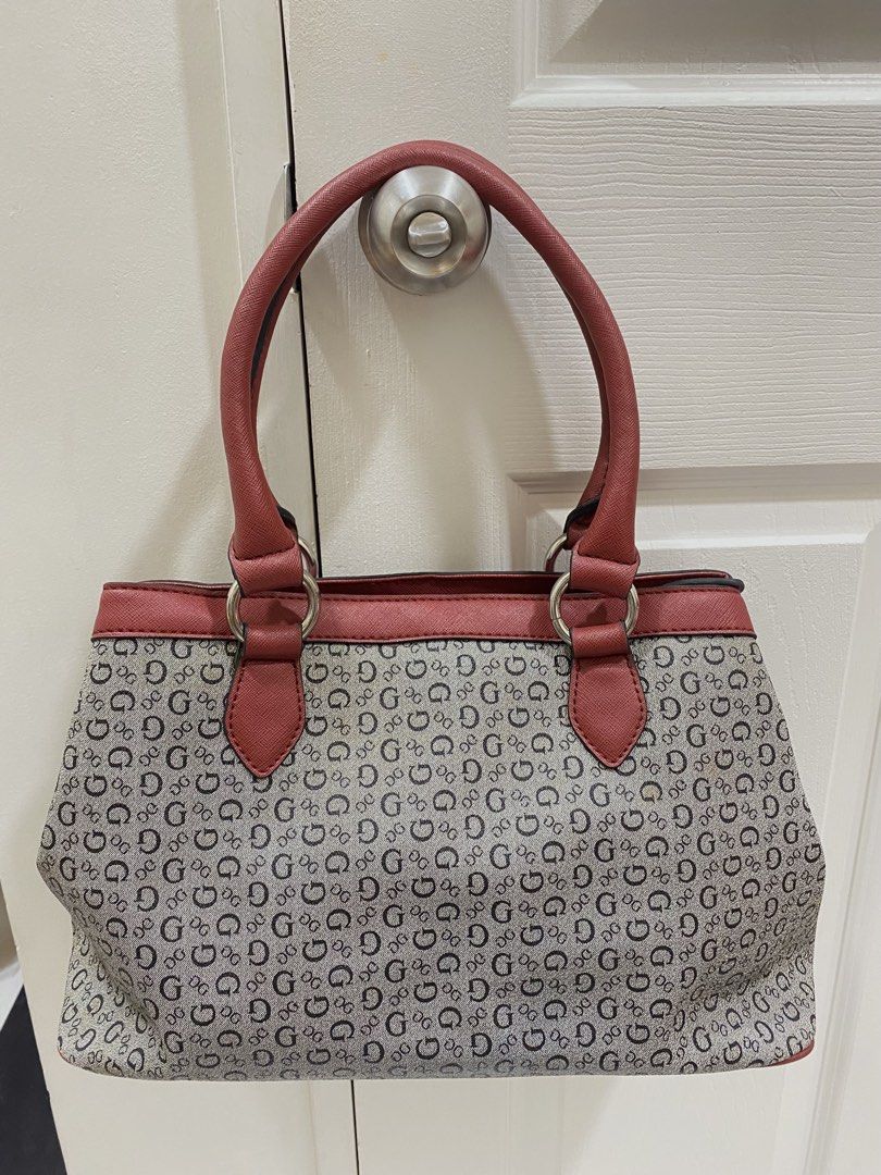 AUTHENTIC Vintage G by GUESS Proposal Classic Monogram Logo Satchel (Category: Shoulder Bags) located in Quezon City. Submitted by maxo____oene (Listing ID 1451745010, Image 3). Description: rfs: natambak lang/decluttering also 😄 the bag is owned by my grandmother, hindi na niya nau-use, so natambak lang talaga honest issue: see attached photos nalang po, may slight light brown color PERO BARELY NOTICEABLE! sa loob din mayroon, pero ‘di naman ma