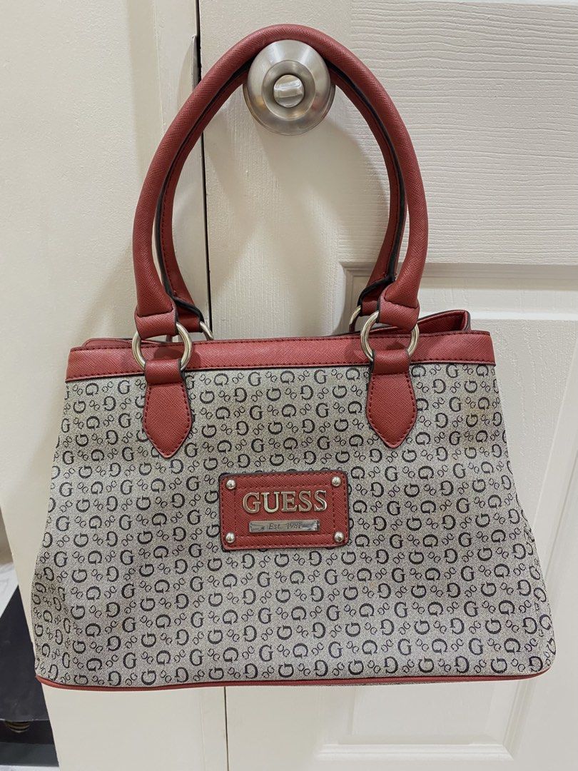 AUTHENTIC Vintage G by GUESS Proposal Classic Monogram Logo Satchel (Category: Shoulder Bags) located in Quezon City. Submitted by maxo____oene (Listing ID 1451745010, Image 1). Description: rfs: natambak lang/decluttering also 😄 the bag is owned by my grandmother, hindi na niya nau-use, so natambak lang talaga honest issue: see attached photos nalang po, may slight light brown color PERO BARELY NOTICEABLE! sa loob din mayroon, pero ‘di naman ma