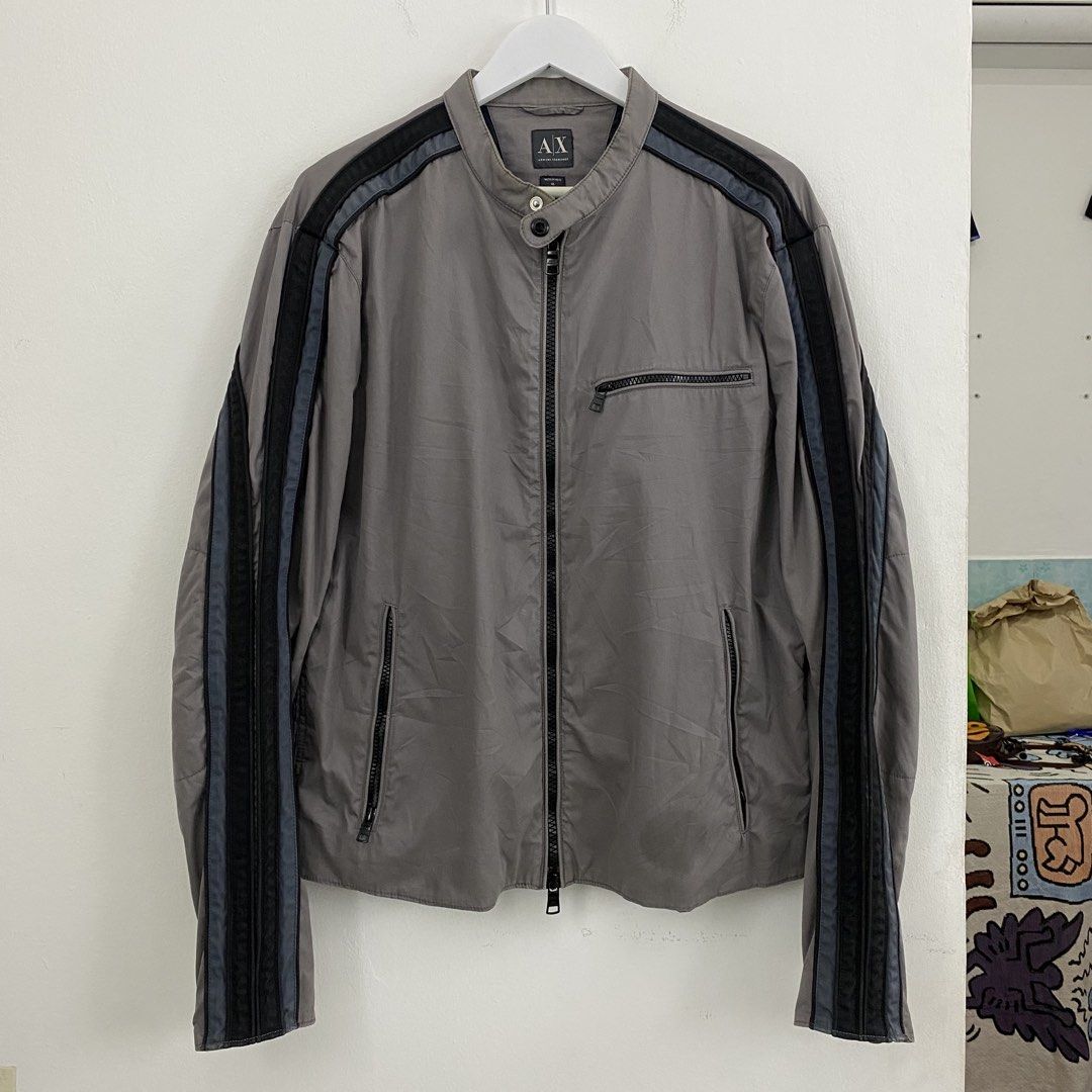 AX Armani Exchange biker jacket (Category: Coats, Jackets and Outerwear) located in Cavite. Submitted by mana__ (Listing ID 1451855248, Image 1). Description: - Grey AX Armani Exchange Jacket - Size: XL - Features racing stripes on sleeves - Zip closure - Pockets included - Ideal for casual wear - XL Width - 23 Length - 27 Shoulders - 20 Sleeve - 26.5 Good condition.