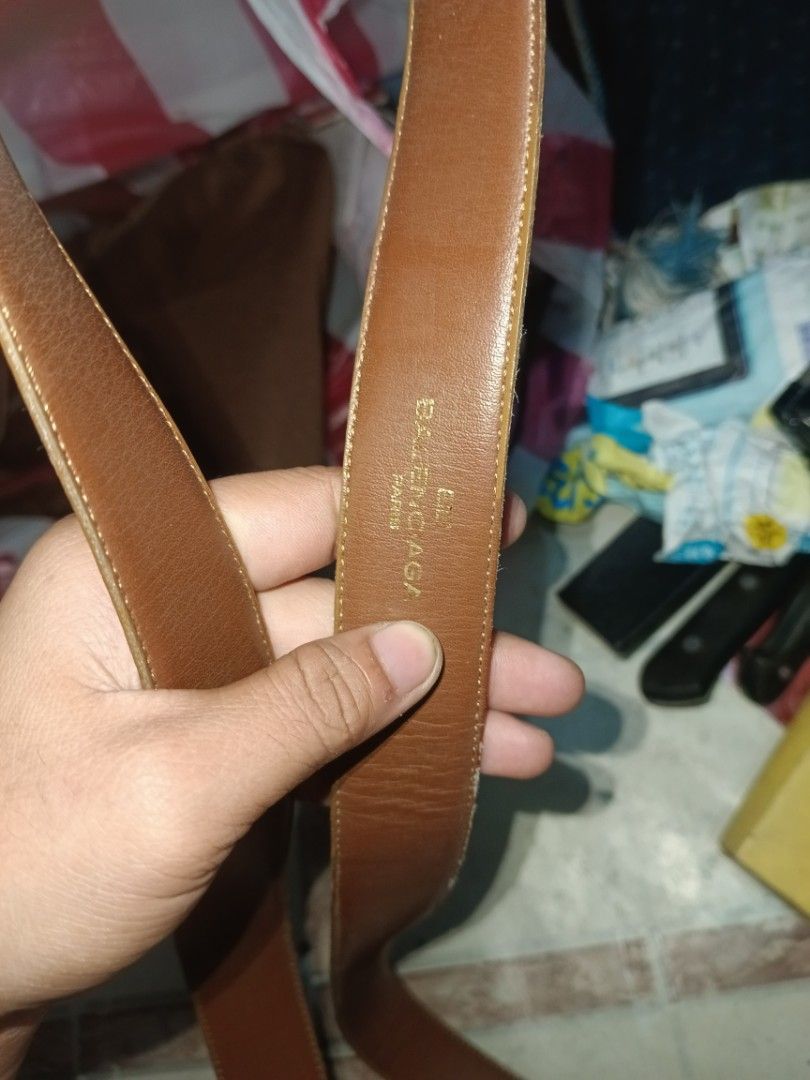 Balenciaga Paris Leather Belt (Category: Belts) located in Valenzuela. Submitted by relchris22 (Listing ID 1451896491, Image 2). Description: - Brand: Balenciaga Paris - Material: Genuine Brown Leather - Buckle: Silver-tone with rectangular inlay - Leather Finish: Textured.