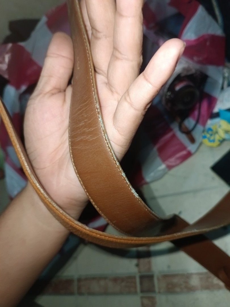 Balenciaga Paris Leather Belt (Category: Belts) located in Valenzuela. Submitted by relchris22 (Listing ID 1451896491, Image 3). Description: - Brand: Balenciaga Paris - Material: Genuine Brown Leather - Buckle: Silver-tone with rectangular inlay - Leather Finish: Textured.