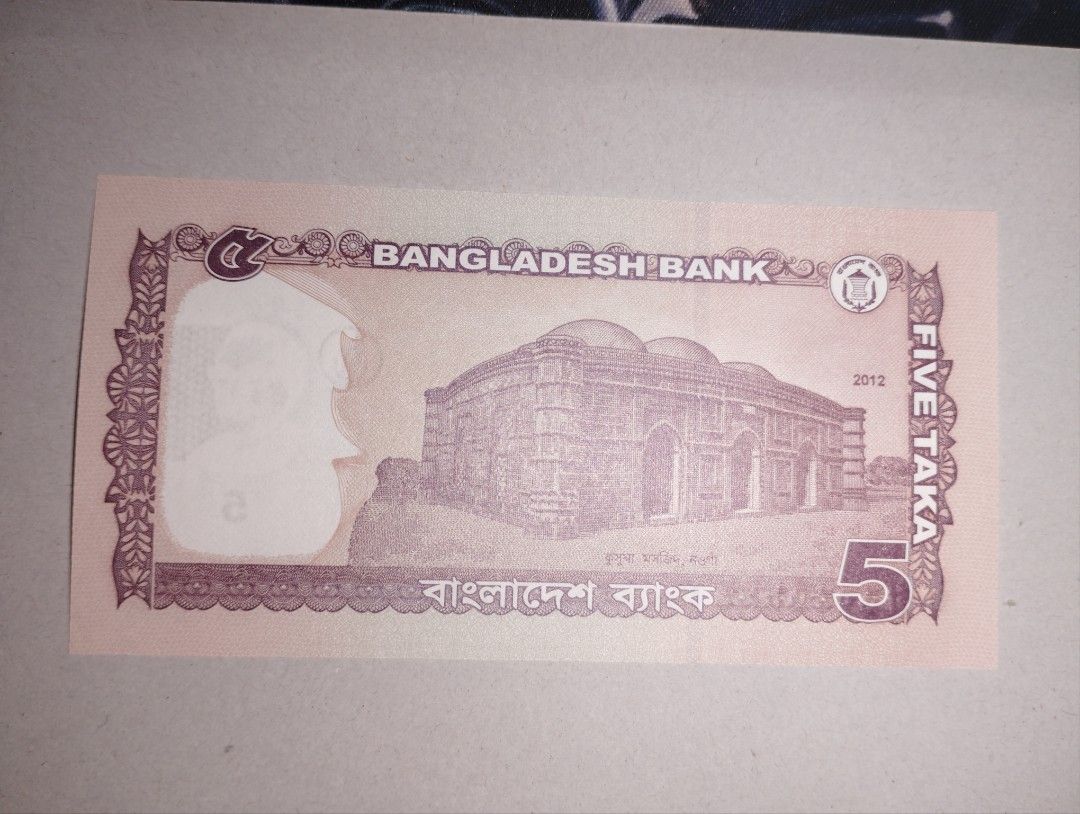 Bangladesh 5 Taka (Category: Currency) located in Baguio. Submitted by maximum_carnage (Listing ID 1451799686, Image 2). Description: - Bangladesh Bank 5 Taka banknote - Year: 2012 - Front: Portrait of Sheikh Mujibur Rahman - Back: Kusumba Mosque - Perfect for currency collectors and history enthusiasts.