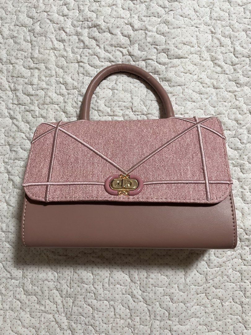Belladonna Pink Textured Top Handle Bag (Category: Shoulder Bags) located in Legazpi City. Submitted by leiivyni (Listing ID 1451898389, Image 1). Description: 𝐝𝐞𝐜𝐥𝐮𝐭𝐭𝐞𝐫𝐢𝐧𝐠 𝐦𝐲 𝐛𝐚𝐠𝐬! ✨💗 - this was given to me as a gift, worn once lang po during a school event and been stocked nalang po sa cabinet huhu. - super ganda and classy niya tignann, spacious din po siya sa loob :)) - no longer used and need funds po :)) - Cute pink handb