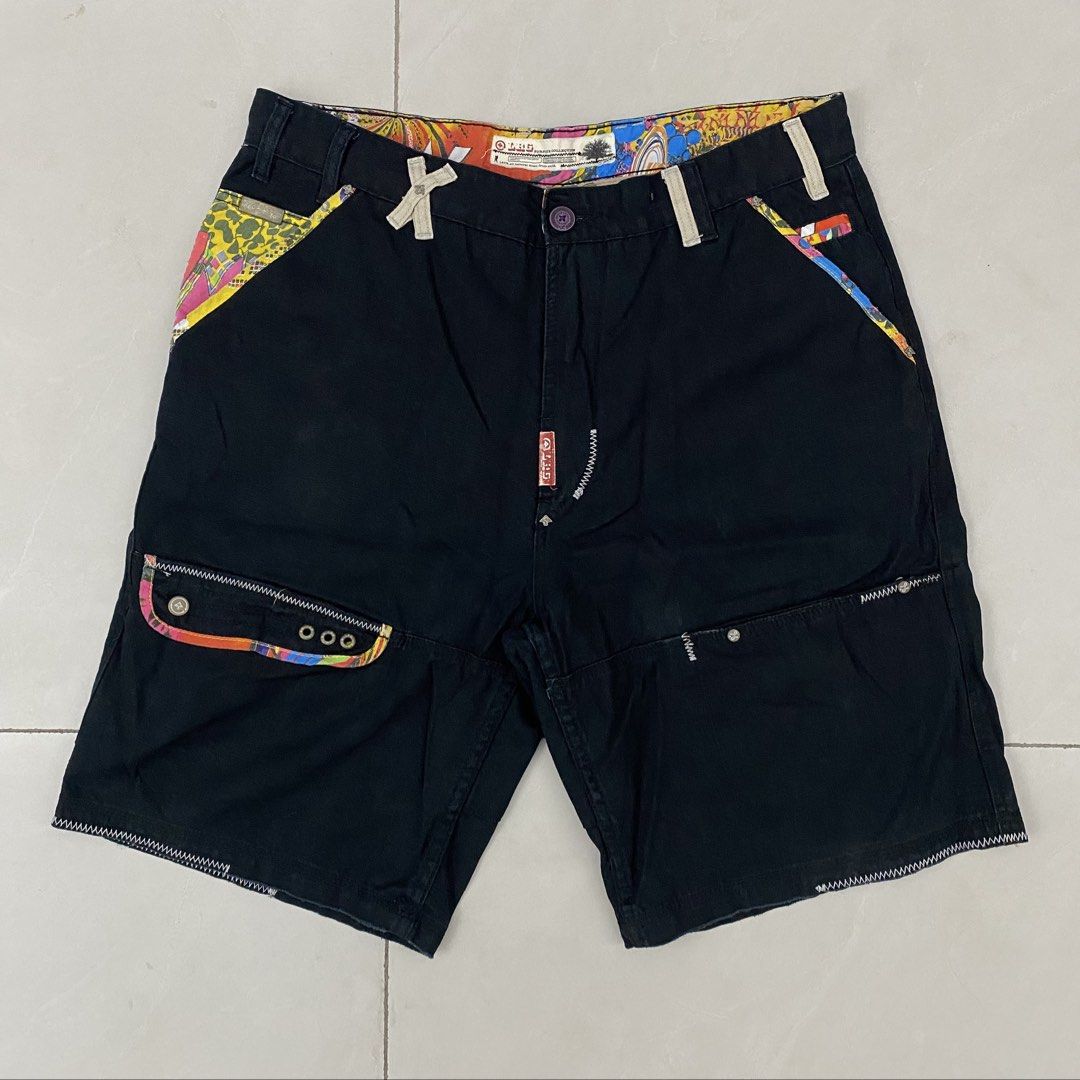 Y2K LRG Jorts (Category: Shorts) located in Cavite. Submitted by mana__ (Listing ID 1451833652, Image 1). Description: - Stylish black cargo shorts - Unique paisley print lining and pocket details - Multiple pockets for ample storage - Secure button and zip fly closure - Adds a pop of color to your casual look - Size 34 Waist - 35-36 Length - 22.5 Inseam - 10 Leg op - 12 Very good.