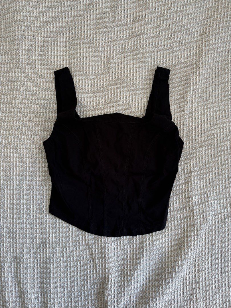 Black Corset Style Square Neck Tank Top (Category: Sleeveless) located in Manila. Submitted by love.loop (Listing ID 1451732688, Image 1). Description: - Stylish black corset-style tank top - Flattering square neckline with thick straps - Fitted bodice with elegant boning details - Estimated size: Small to Medium - Highly versatile: perfect for dressing up or down - A must-have staple for any wardrobe.