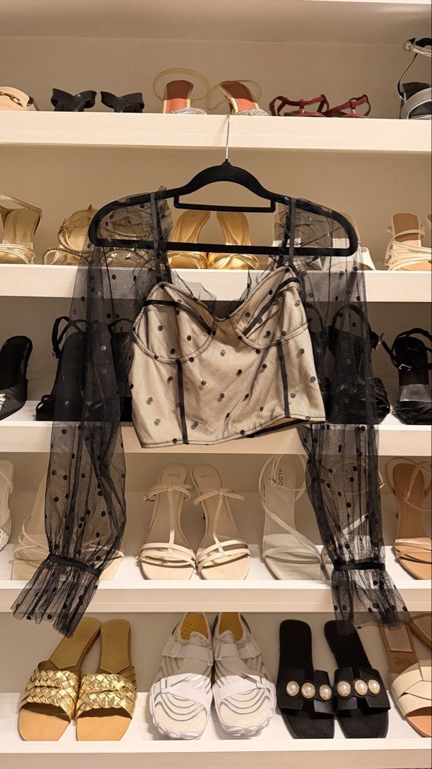 Black Polka Dot Mesh Long Sleeve Crop Top (Category: Longsleeves) located in Quezon City. Submitted by closetcleanupfairy (Listing ID 1451801745, Image 2). Description: - Sheer black mesh fabric with polka dots - Sweetheart neckline - Long puff sleeves with ruffled cuffs - Versatile for layering (bralette/cami recommended) - Ideal for night outs or special occasions - Trendy and chic style.