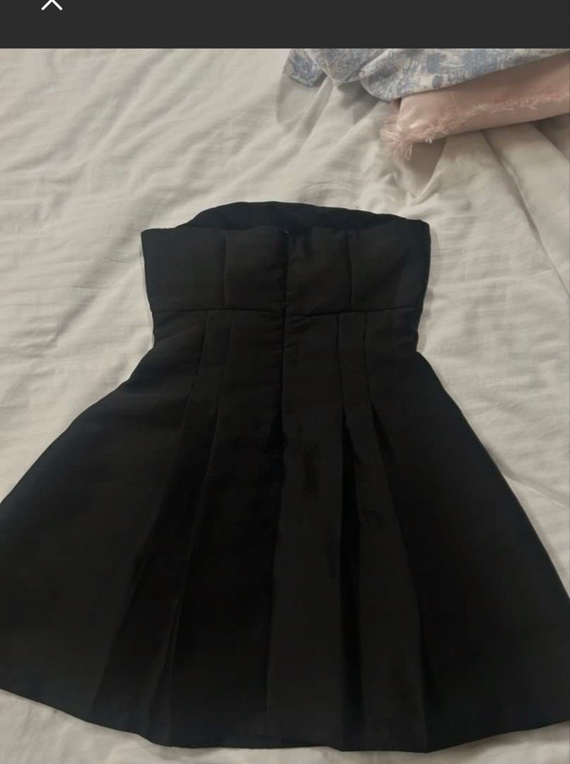 Black ribbon dress (Category: Dresses) located in Taguig. Submitted by chen.preloveddd (Listing ID 1451796175, Image 3). Description: - Can fit S-M frame - Waist 26-28 - Decluttering, no damages/stains 📍 Taguig south signal village Courier: Lalamove or jnt.
