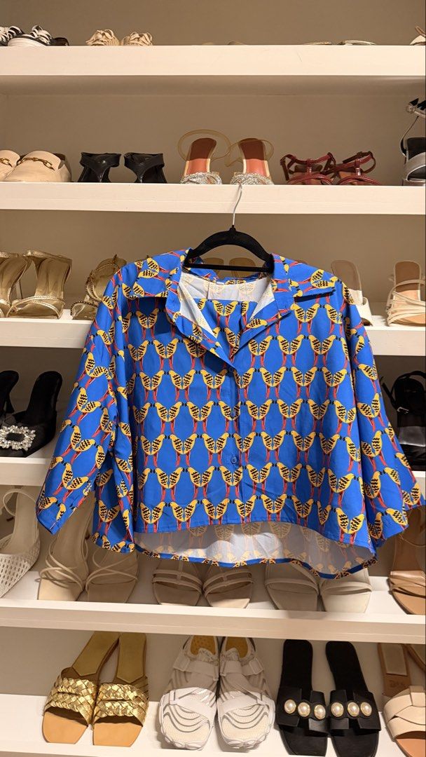 Blue Bird Print Button-Up Coord Set (Category: Sets or Coordinates) located in Quezon City. Submitted by closetcleanupfairy (Listing ID 1451802259, Image 3). Description: - Adorable matching set - Blue background with a fun bird print - Short-sleeve button-up shirt - Comfortable shorts - Versatile: great for casual outings or vacations - Can be worn as a set or as individual pieces.