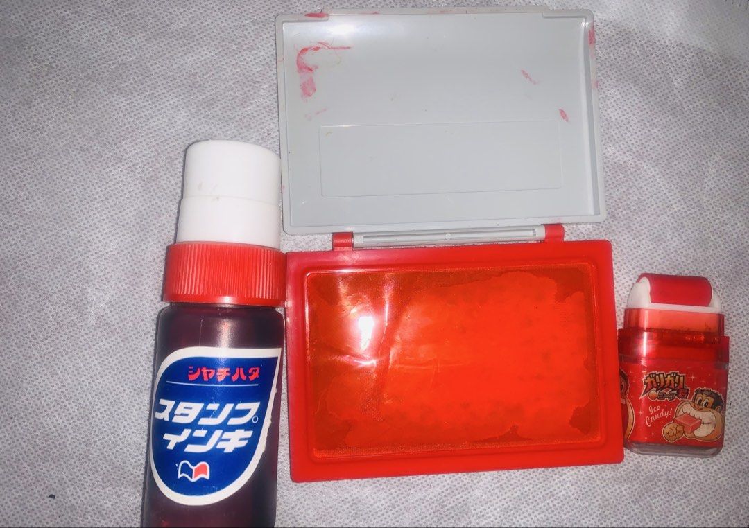 Bundle (Category: Craft Supplies & Tools) located in Pasig City. Submitted by monad13q (Listing ID 1451756333, Image 3). Description: From japan with ink stamp This is a bottle of Shachihata brand stamp refill ink, designed for water-based dye stamp pads. • The product pictured is the small 55g version, commonly available in colors like red, vermilion, and indigo. • It features a distinctive blue label with Japanese text and a white applicator ti