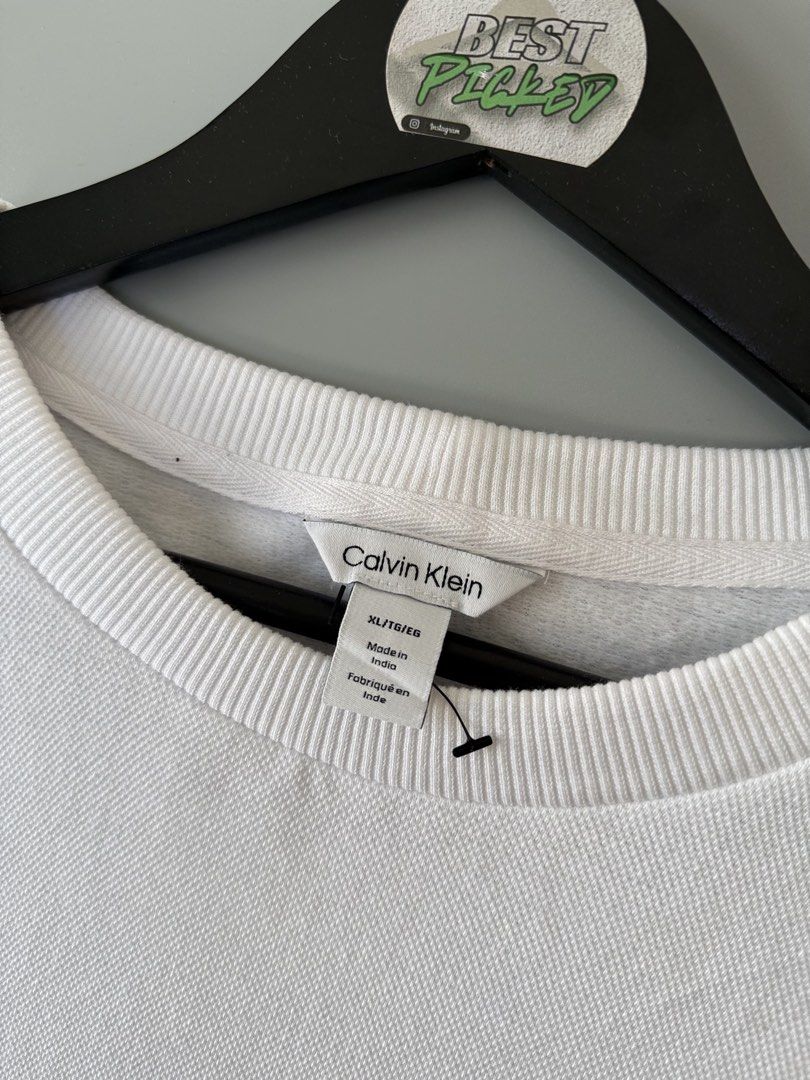 Calvin klein longsleeve sweater (Category: Activewear) located in Cebu City. Submitted by bestpicked (Listing ID 1451739457, Image 3). Description: Authentic Good as new condition Size XL on tag Dimension 26x30 No issue.